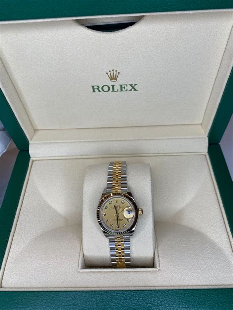 how much gold is in a gold rolex|rolex value lookup.